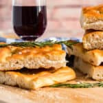 slices of focaccia bread and glass of wine